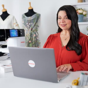 woman installing Bernina software on laptop